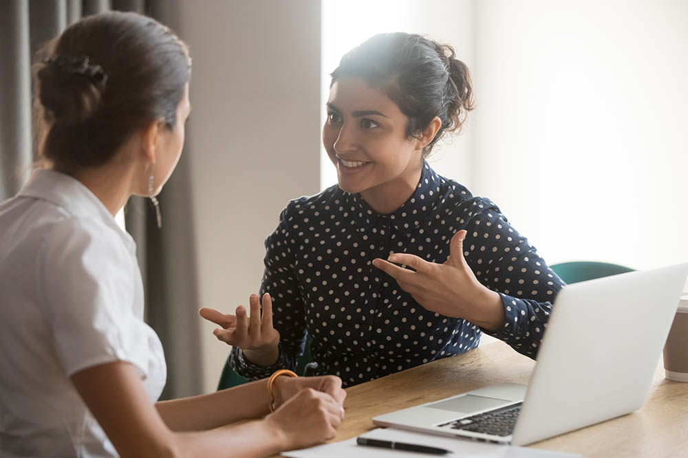 closing a sale - women closing a deal