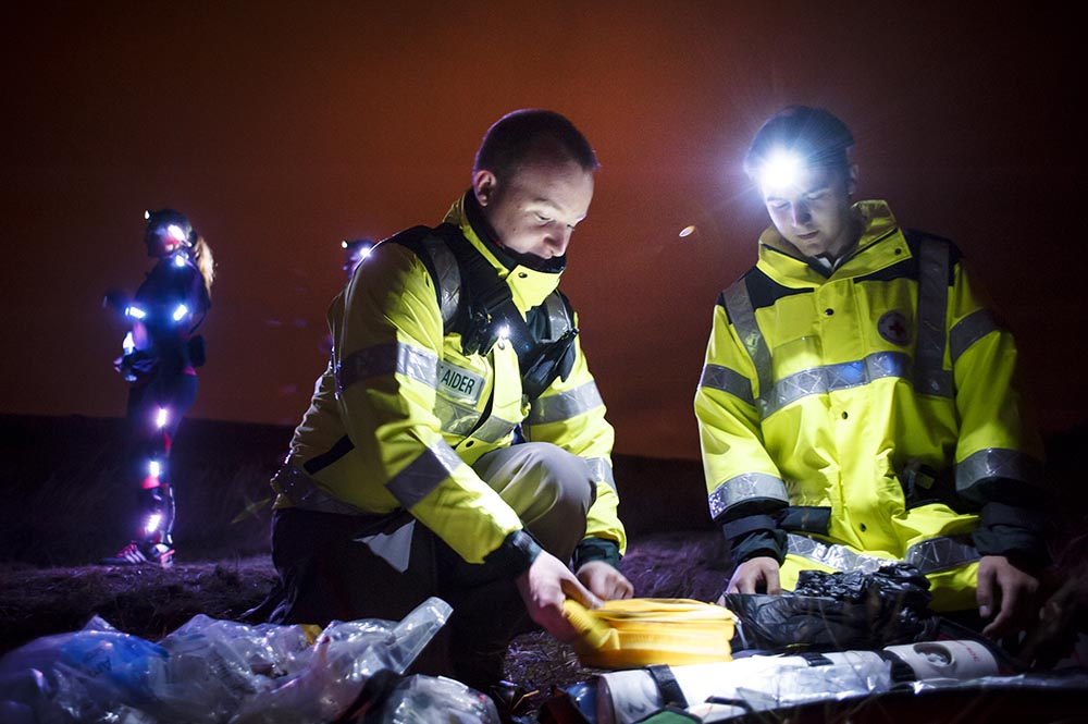 British Red Cross in a field at night